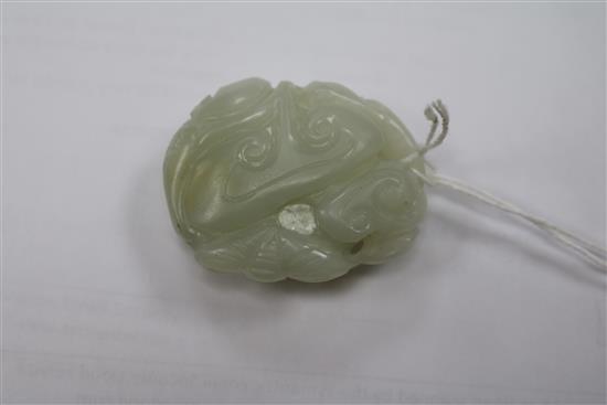 A Chinese pale celadon jade carving of a monkey and lingzhi fungus, 18th century 5cm